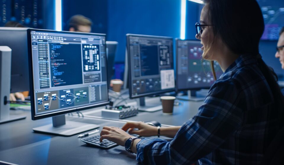 Business hand clicking "Hire" on a laptop screen displaying profiles of senior DevOps Engineers next to a 48-hour countdown clock