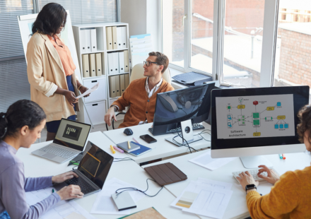 A professional team of enterprise Java backend developers collaborating on scalable server-side architecture.