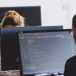 Hire Microservices Architecture developers for scalable, decoupled software systems – illustration of interconnected service nodes and developer tools.