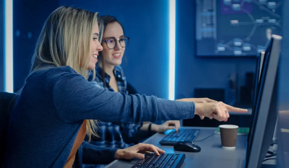 Modern Cloud Engineer working with AI-powered dashboards, Kubernetes containers, and multi-cloud platforms in 2026.