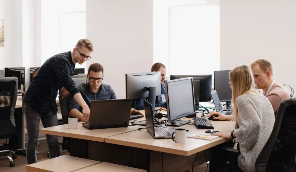 TechLynx US team of expert Custom API Developers working on seamless cloud-based software integration and API architecture.