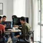Software engineering team collaborating on backend architecture with servers, databases, and API workflows, highlighting the value of Backend Talent