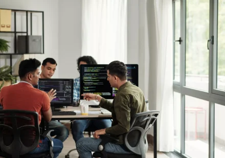 Software engineering team collaborating on backend architecture with servers, databases, and API workflows, highlighting the value of Backend Talent