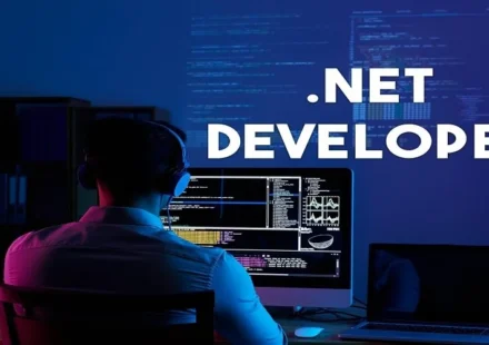 Enterprise HR team and technical leads interviewing a .NET developer with code on screen, showcasing the process to Hire .NET Developers for scalable applications