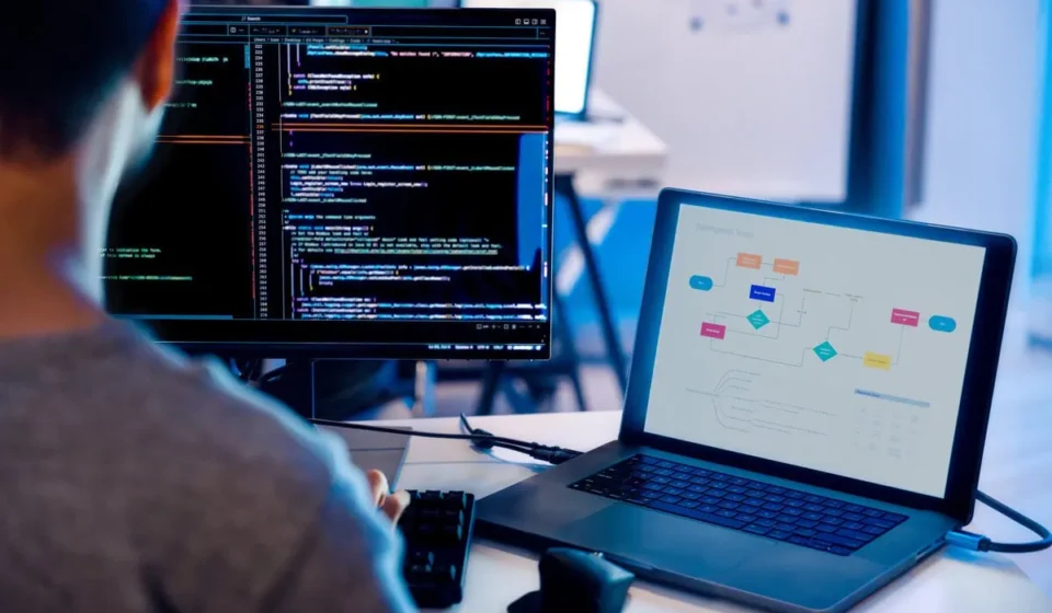 Experienced Backend Developers monitoring server performance dashboards and optimizing APIs, showcasing the DevOps Engineer Skills that boost app performance