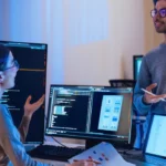Engineering hiring manager reviewing Infrastructure as Code scripts and Terraform templates on screen while interviewing a DevOps candidate