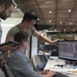 CTO collaborating with Specialized IT Recruiters to review senior engineering candidate profiles for a hard-to-fill technical role