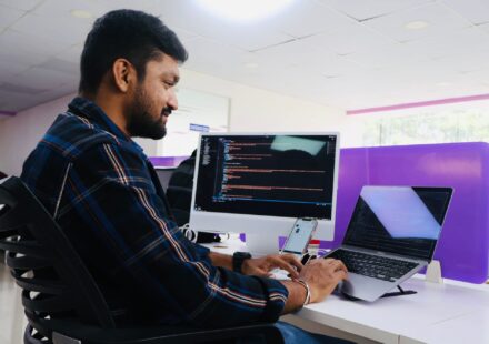 Engineering manager pairing developer profiles with programming languages and frameworks on a digital matrix, selecting the Right Technology Stack for each role