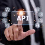 API developer designing RESTful endpoints and microservices on a multi-monitor setup, showcasing what defines a Great API Developer