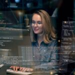 Recruiter and engineering lead reviewing DevOps Engineer Skills on a hiring scorecard to identify top DevOps Engineering Talent