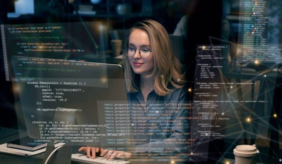 Recruiter and engineering lead reviewing DevOps Engineer Skills on a hiring scorecard to identify top DevOps Engineering Talent
