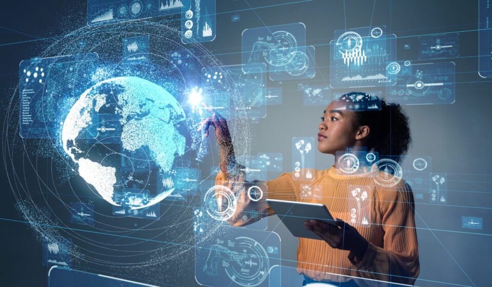 A futuristic illustration featuring a large shipping container transformed into a digital ecosystem, with Docker and Kubernetes logos visible on its surface. Inside the transparent container, software engineers collaborate around microservices, APIs, and deployment pipelines. Arrows show containers moving seamlessly between development, testing, and production environments. Overlaid text reads "How Container Technology Is Changing Technical Hiring." The image represents how Container Technology is reshaping the skills employers demand.